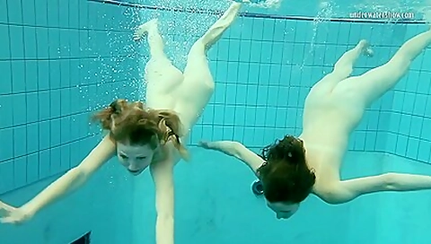 Nastya Undresses Libuse In The Pool Like A Lesbian