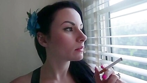 Brunette Smoking Blowjob And Swallows Cum